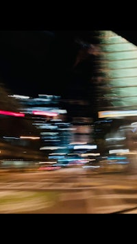 a blurry image of a city at night