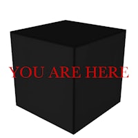 a black cube with the words you are here